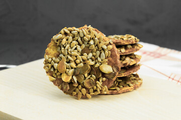 Fresh cookies with milk on a wooden table