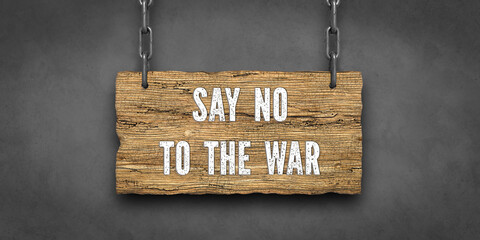 wooden sign with message SAY NO TO THE WAR on concrete background