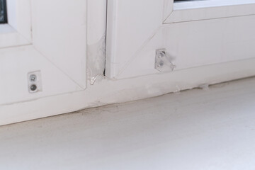 frozen window indoors in winter. Ice forming on the inside of a window in the wintertime