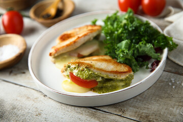 Chicken stuffed with pesto, tomato and cheese