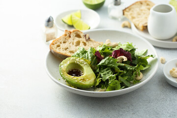 Healthy green salad with avocado
