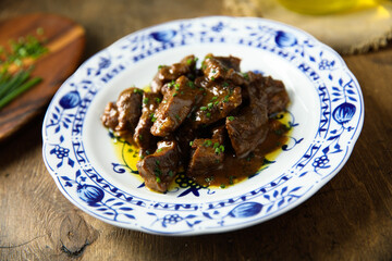 Homemade beef ragout with chives