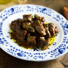 Homemade beef ragout with chives