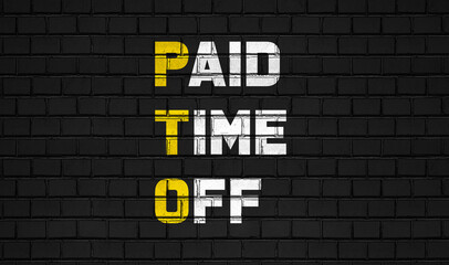 Paid time off (PTO) concept,business abbreviations on black wall 