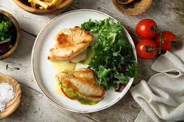 Chicken stuffed with pesto, tomato and cheese