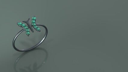 butterfly ring in black gold and emerald color stone 3d render