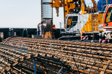 Naklejka premium The beginning of the construction of a concrete bridge in the field