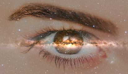 Milky Way galaxy in the beautiful girl eye with  frightened girl