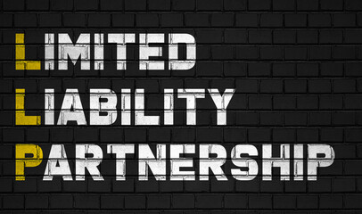 Limited liability partnership (LLP) concept,business abbreviations on black wall 
