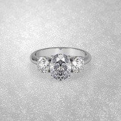 three stone engagement ring laying down position in metal gold 3D render