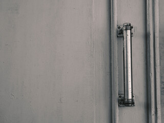 gray door and metal door handle