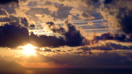Beautiful sunset with clouds and sea