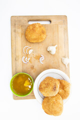 poori or puri with spicy Chole Bhature isolated on white