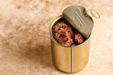 Stew meal - beef in metallic jar. Canned meat. Opened jar with beef stew. Russian Tushenka