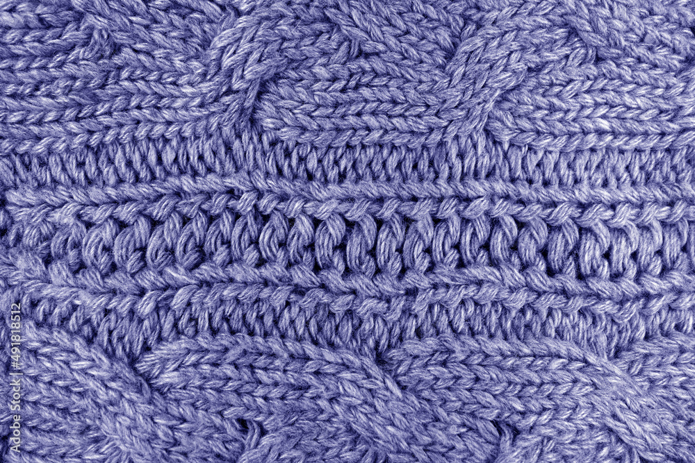 Wall mural Warm knitting texture in blue color.