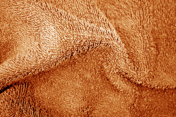 Bath towel texture in orange color.