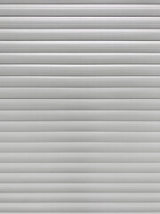 Obraz premium Gray wall with horizontal lines and blur