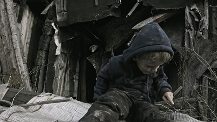 Obraz premium A child is crying in the ruins