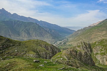 Fototapeta na wymiar A mountain valley in the gorge of the Cherek-Balkar River in the vicinity of the Gymyhli tract. Caucasus 2021