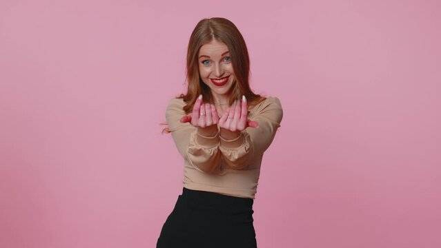 Need some more, please give me. Businesswoman in blouse showing a little bit gesture with sceptic smile, showing minimum sign, measuring small size. Indoors studio shot isolated on pink background