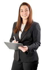 Business woman holding a tablet, wearing a suit, smiling looking at camera. with Isolated on white...