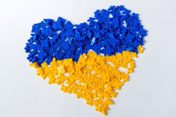 Fototapeta premium blue and yellow heart on white background