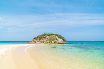 Yanui Beach with crystal clear water and island, near Promthep Cape, famous tourist destination and resort area, Phuket, Thailand