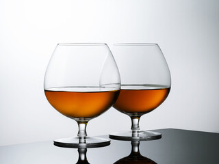 Glass of whiskey solated on white background