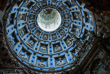 Fototapeta na wymiar The ancient interior in low light of Boim Chapel in Lviv Ukraine, october 2012