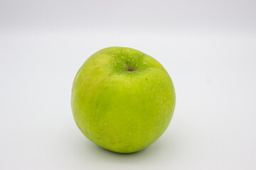 One green apple on white background