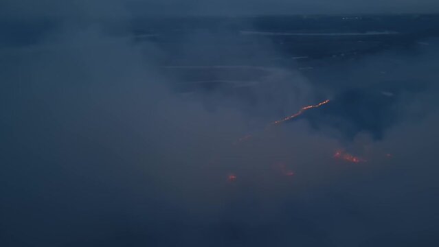 field fire, peat burning shooting from a drone 