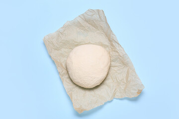 Raw dough on color background