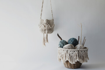 Handmade macrame on white background.