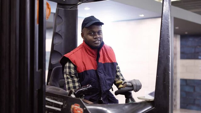 African American forklift operator in the warehouse