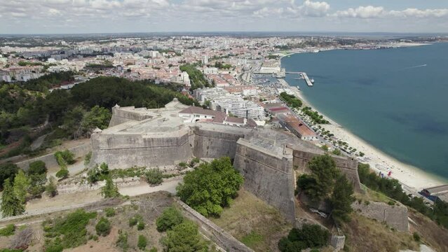 Aerial view of star-shaped Fortress of São Filipe atop rocky crag
