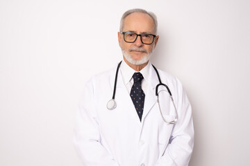 Fototapeta premium Smiling medical doctor with stethoscope. Isolated over white background