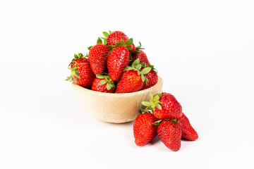 strawberries in bowl on marble on white background