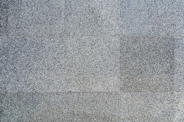 Background texture of gray granite slabs.