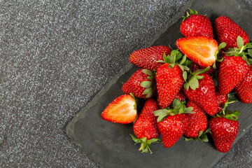 strawberries on black background