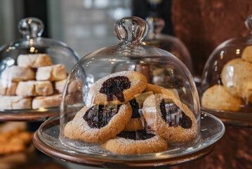 Homemade cookies under a glass jar