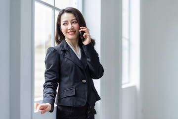 Young Asian businesswoman working at office