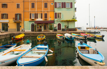 Fototapeta na wymiar Winter at the Castelletto di Brenzone waterfront on Lake Garda in Verona Province, Veneto, north east Italy 
