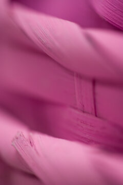 Pink Easter Baskets &ndash; close-up, selective focus, abstract background texture of stacked wooden Easter baskets