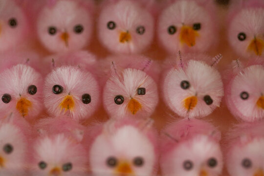 cute, fluffy, pink Easter chicks &ndash; extreme close-up, full frame, pastel toys