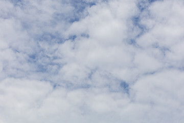 Fototapeta premium Sunshine clouds sky during morning background. Blue,white pastel heaven,soft focus lens flare sunlight. Abstract blurred cyan gradient of peaceful nature. Open view out windows beautiful summer spring