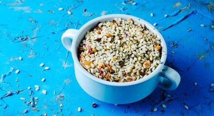 bowl with mixture to prepare risotto alla toscana