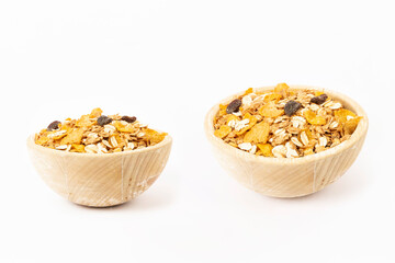 corn flakes in bowl on white background