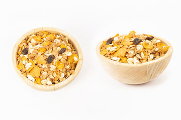 corn flakes in bowl on white background