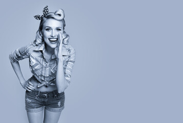 Portrait of beautiful happy smiling woman, dressed in pin up style. Caucasian blond girl posing in retro fashion and vintage concept. Black and white. Copy space.