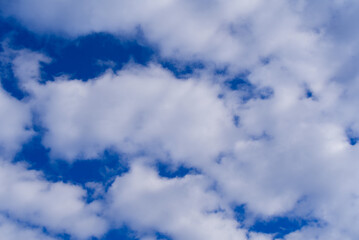 Obraz premium Puffy clouds up in the sky at City of Zürich on a cloudy winter day. Photo taken February 18th, 2022, Zurich, Switzerland.